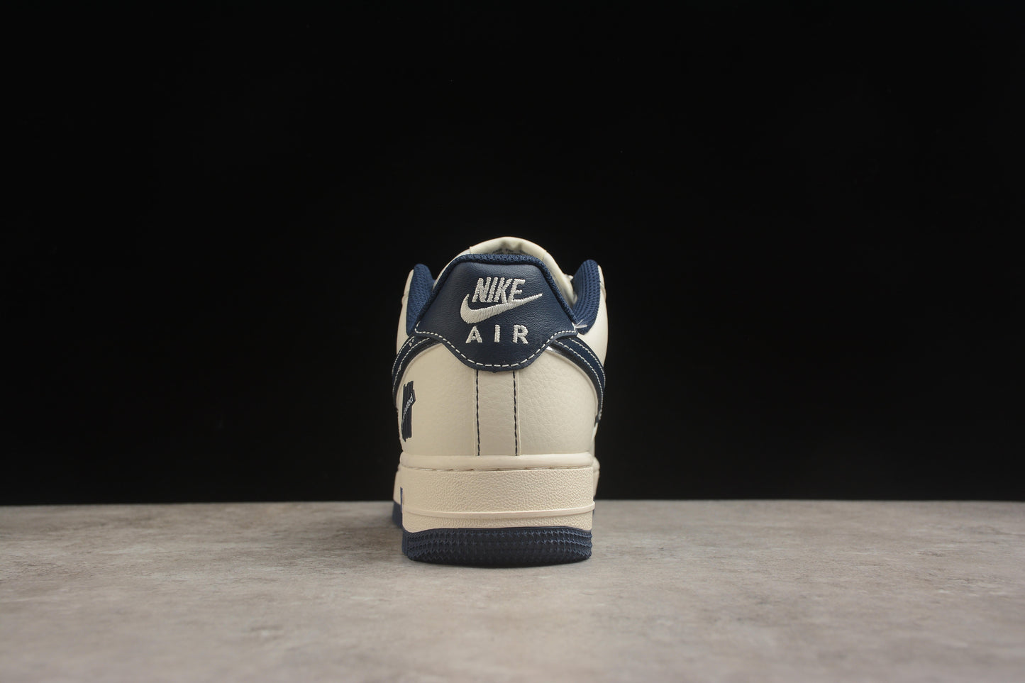 Air Force 1 Low x Undefeated “5 On It” Light Cream / Navy