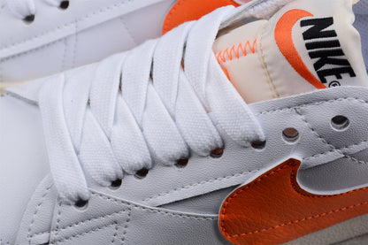 Blazer Low ’77 White / Orange