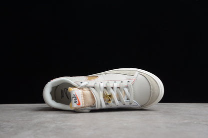 Blazer Low ’77 White / Gold / Red