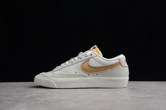 Blazer Low ’77 White / Gold / Red